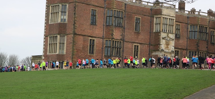 Temple Newsam parkrunners passing Temple Newsam House